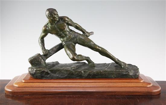 Pierre Le Faguays. A patinated bronze figure of a man working a tiller, overall 21in. incl. base